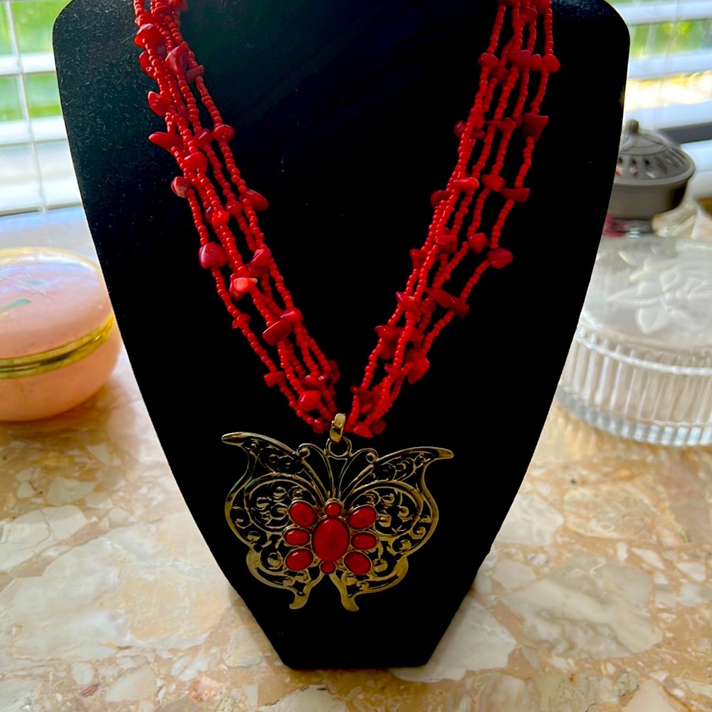 Red coral and beads necklace with butterfly pendant